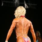 Kristi   Tauti  - IFBB Sacramento Pro  2009 - #1